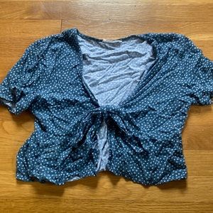 Blue top with white flowers, ties in the front